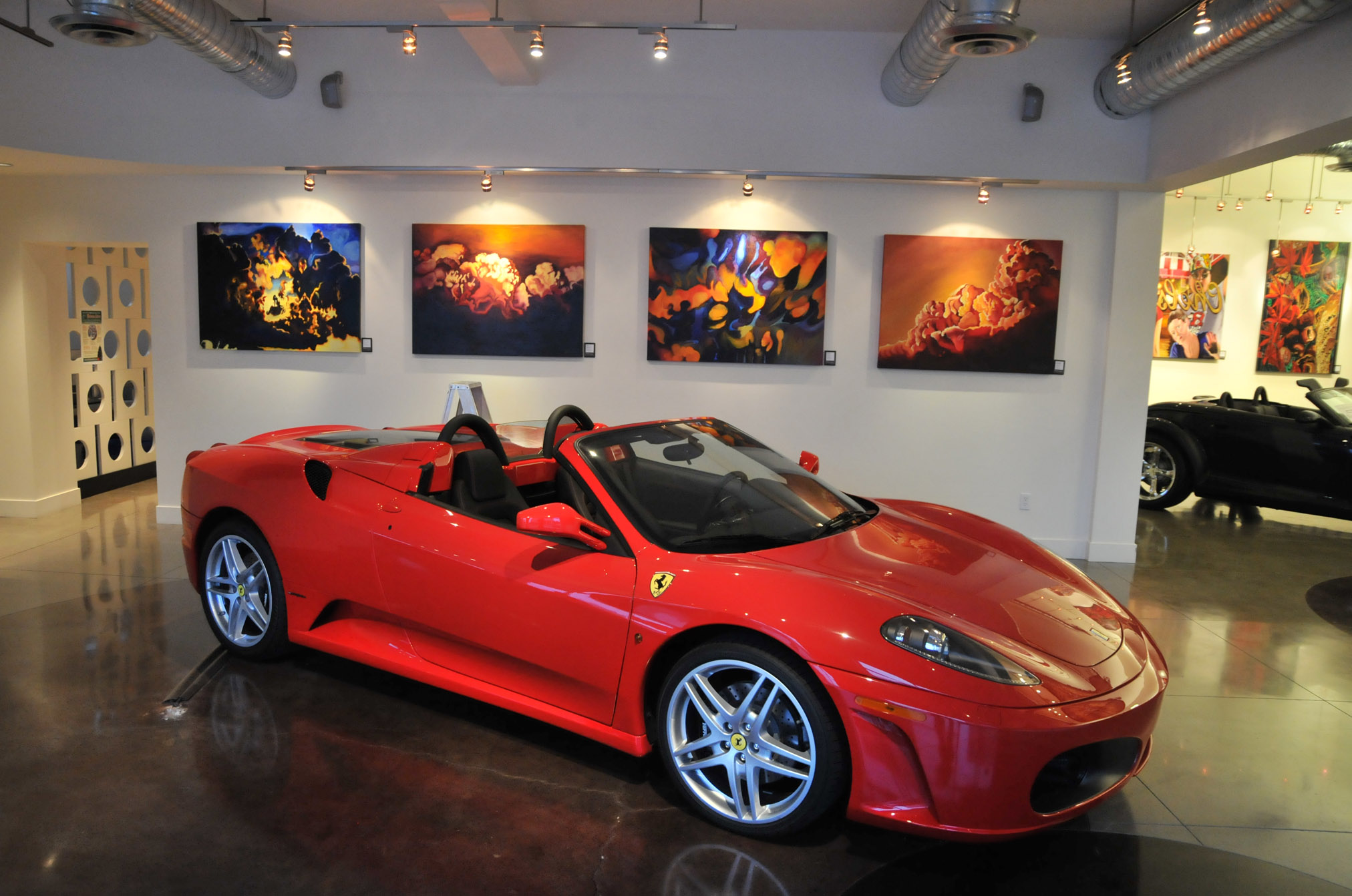 Paintings by Canadian artist Brandy Saturley at Victoria Premium Automobiles