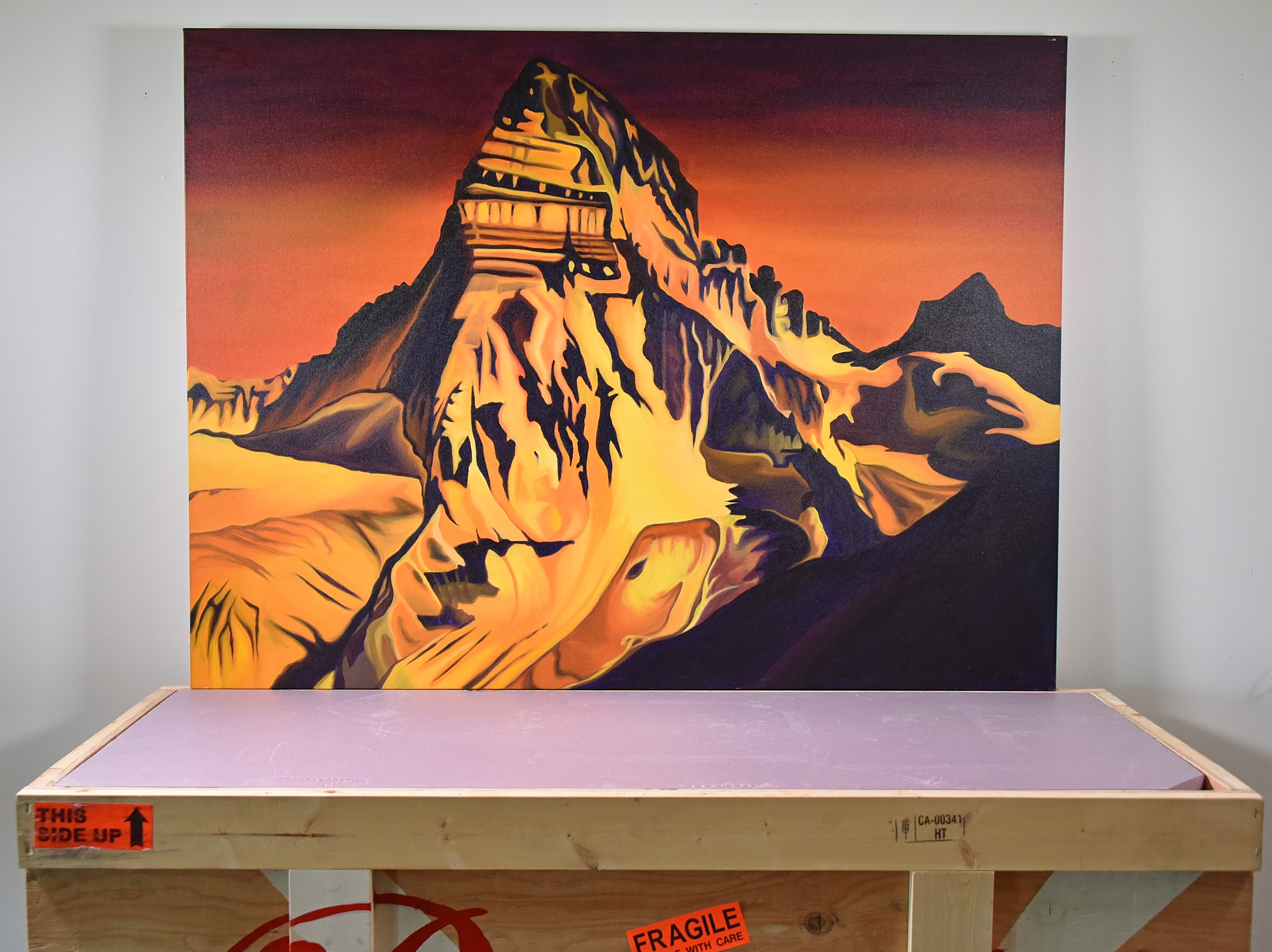 a painting of mount assiniboine